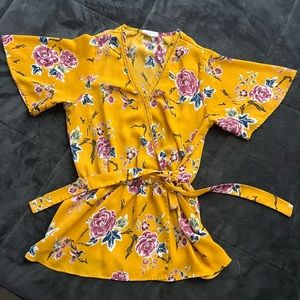 Gorgeous v-neck, tie waist, floral blouse.